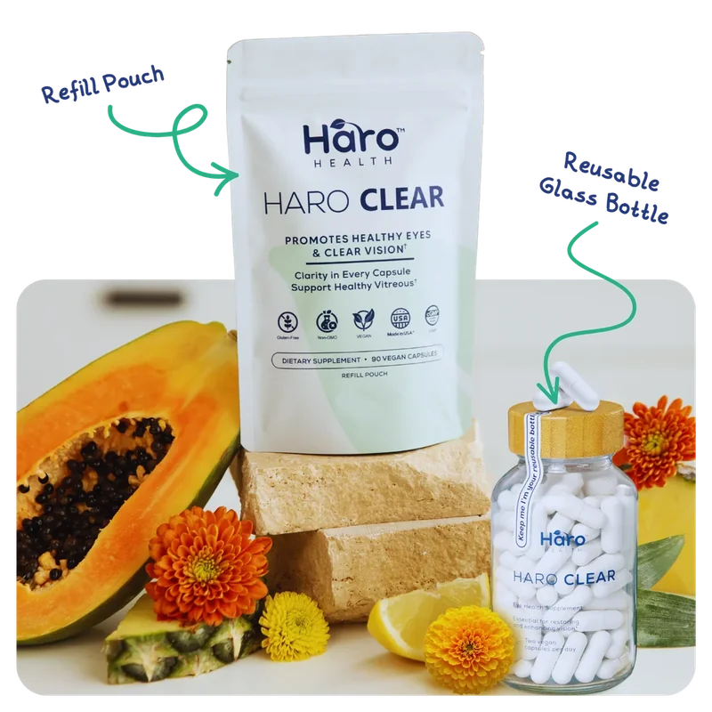 Haro Clear refill pouch and reusable glass bottle with fruit and flowers